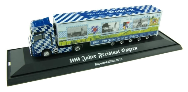 Herpa 932547 MAN TGX XXL Euro 6c Meusburger-Sattelzug Bayern LKW 2018 100 Jahre Freistaat Bayern